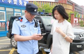 【高考暖心事】考生证件遗落正着急 民警紧急接送真给力